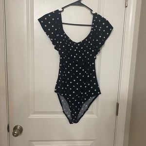 Black and white off the shoulder body suit